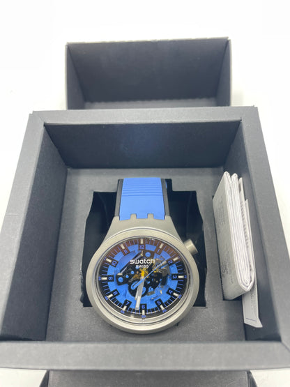 Montre Swatch bleu noir