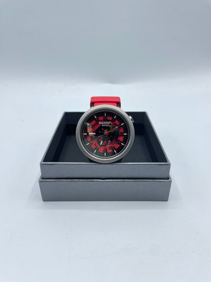 Montre Swatch rouge noir